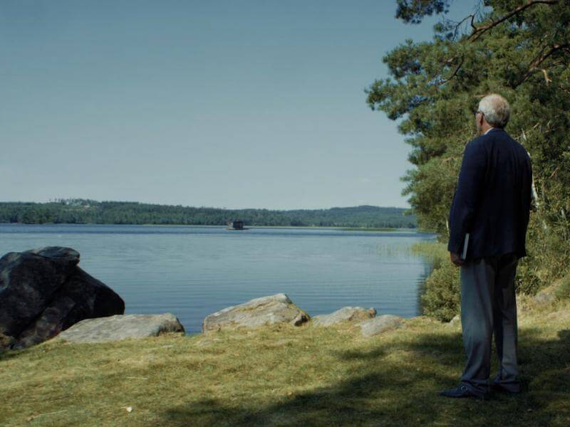 Thomas Widstrand, CEO, standing by a lake.